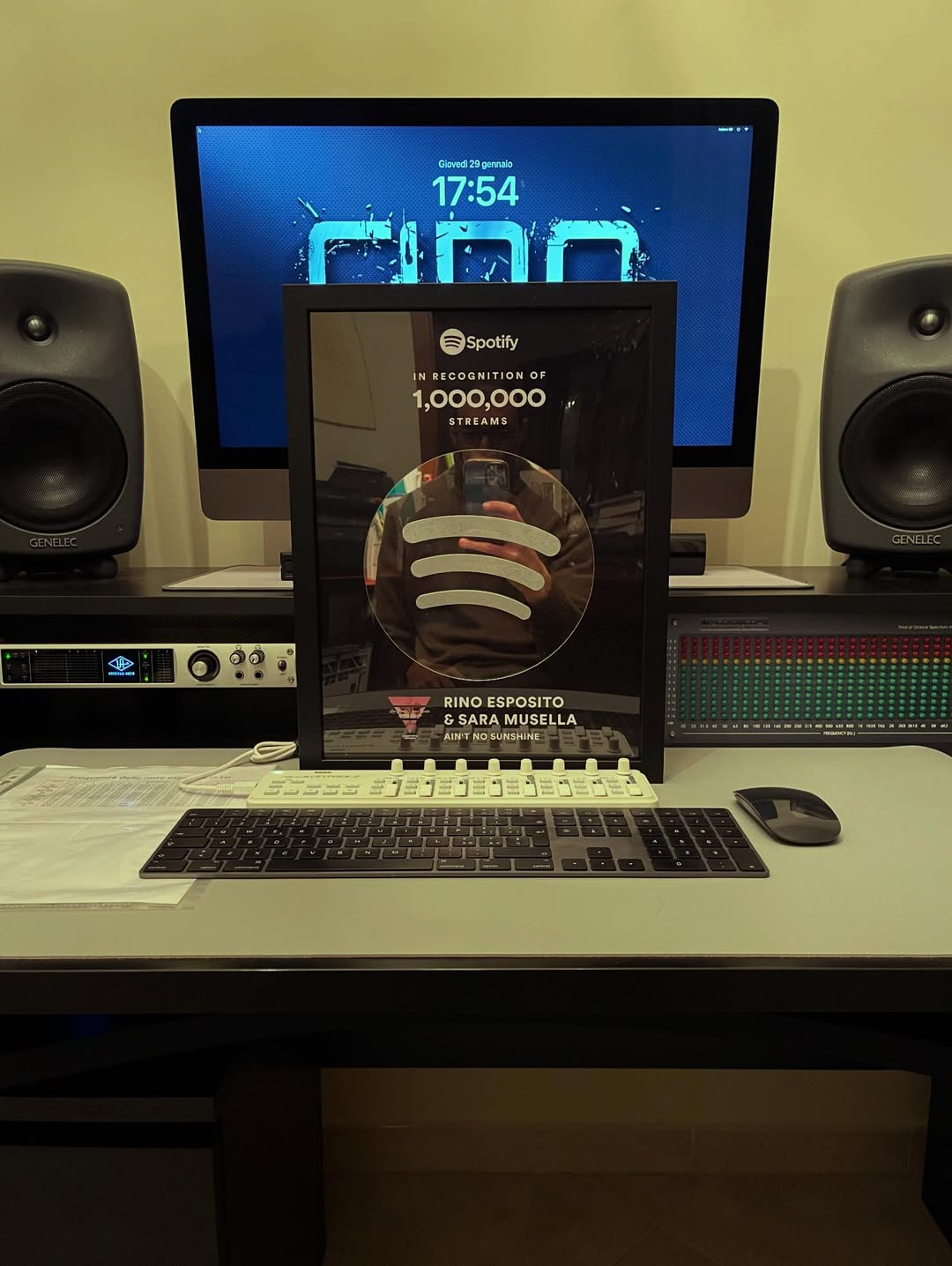 Spotify Award frame on wall